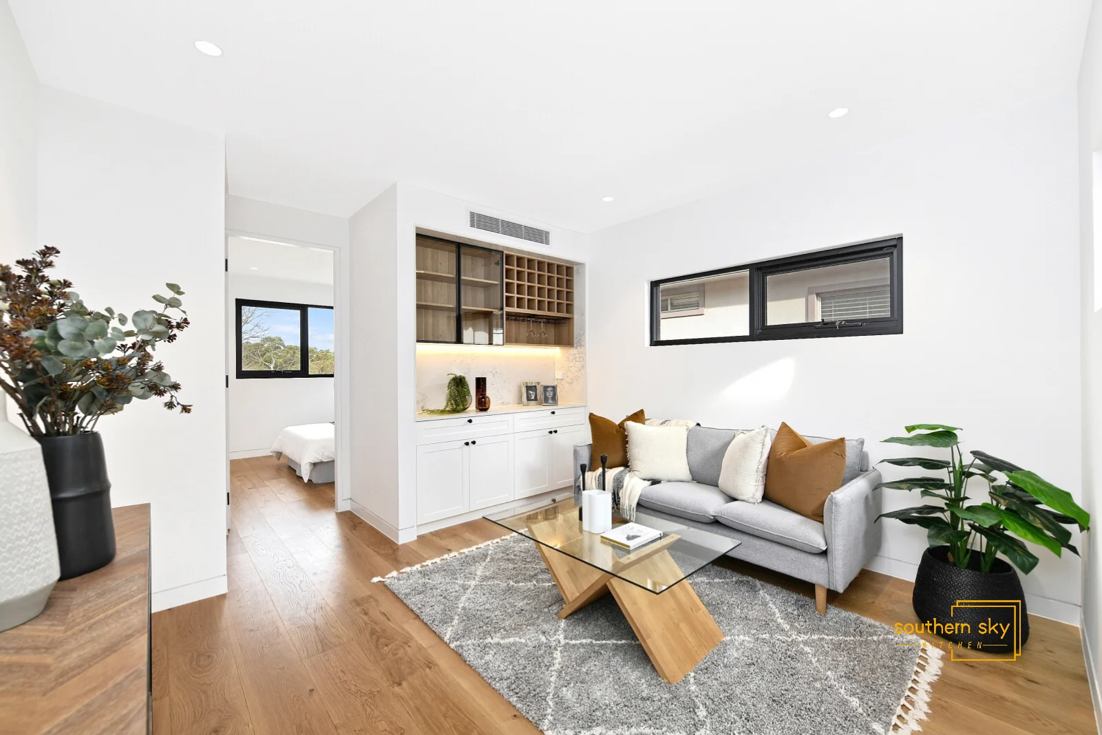 Elegant living room, blending modern design with rich textures. Exquisite craftsmanship meets sleek style for ultimate sophistication.