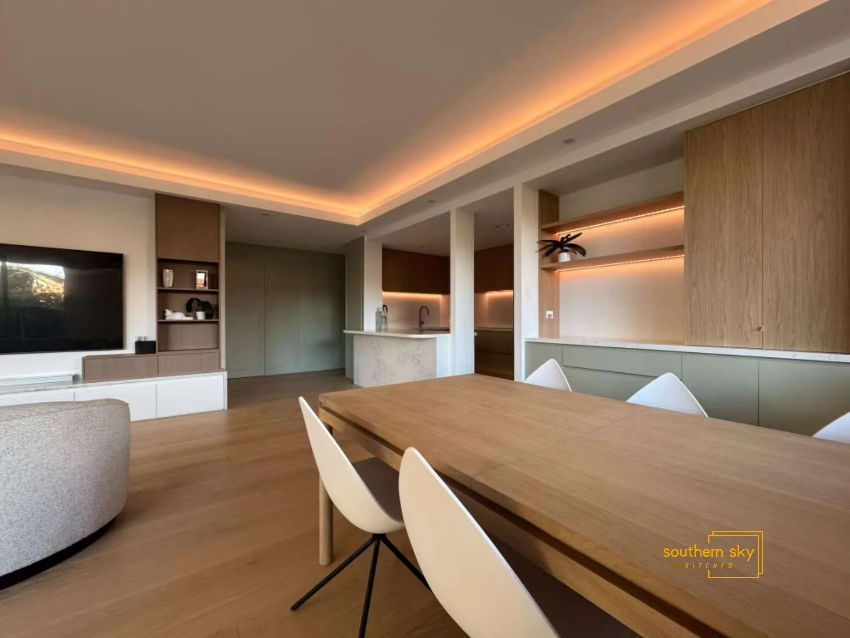 Elegant dining space with sleek modern design, showcasing superior craftsmanship and ambient lighting for a luxurious feel.