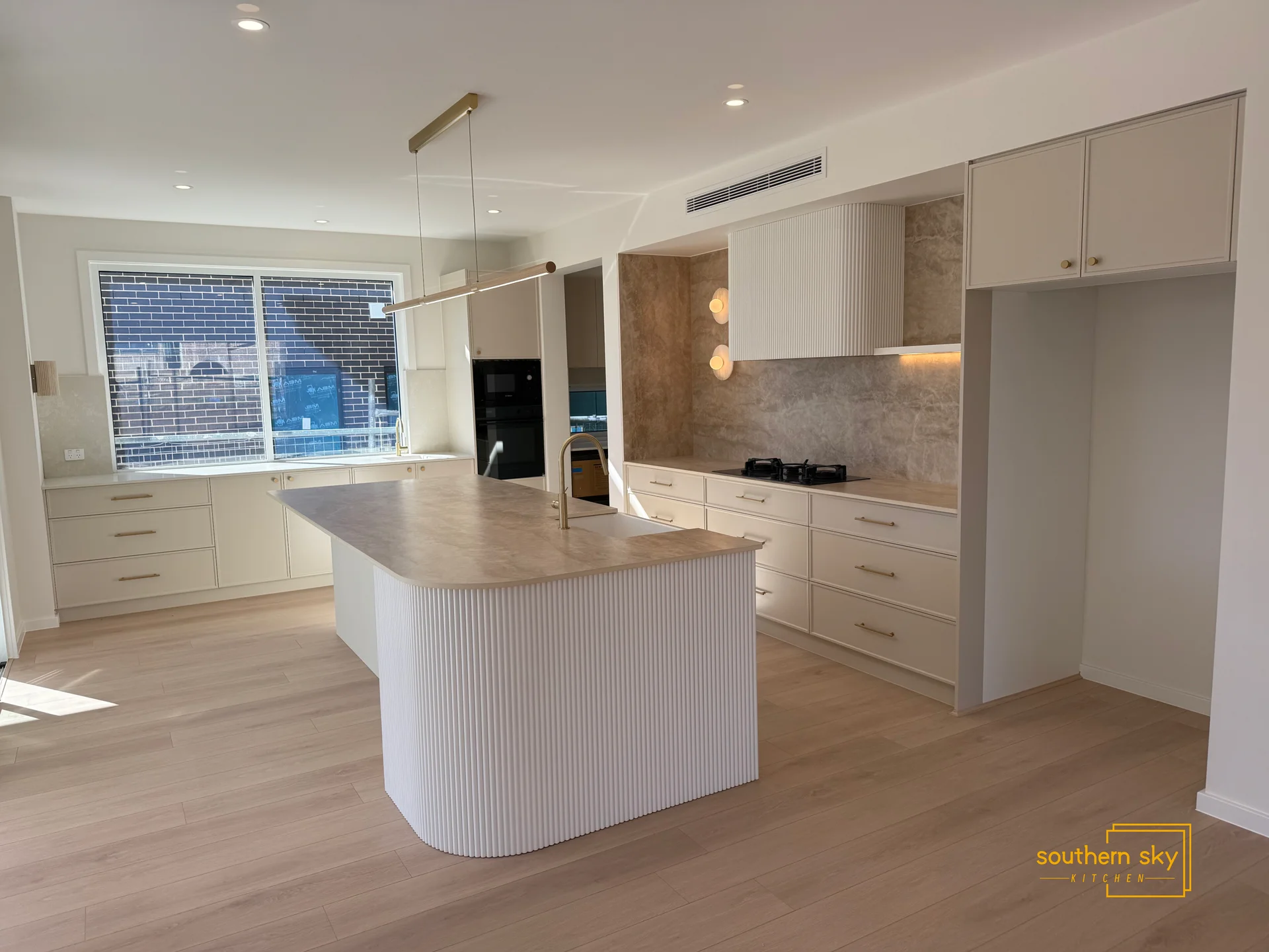 Luxurious kitchen with sleek design, premium materials, and exquisite craftsmanship for modern elegance.