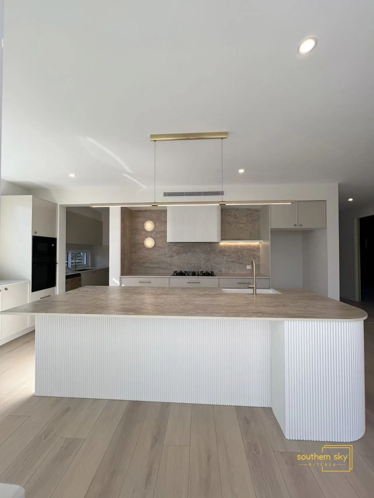 Luxurious kitchen with exquisite design, showcasing premium craftsmanship and elegance. Perfect blend of style and functionality.