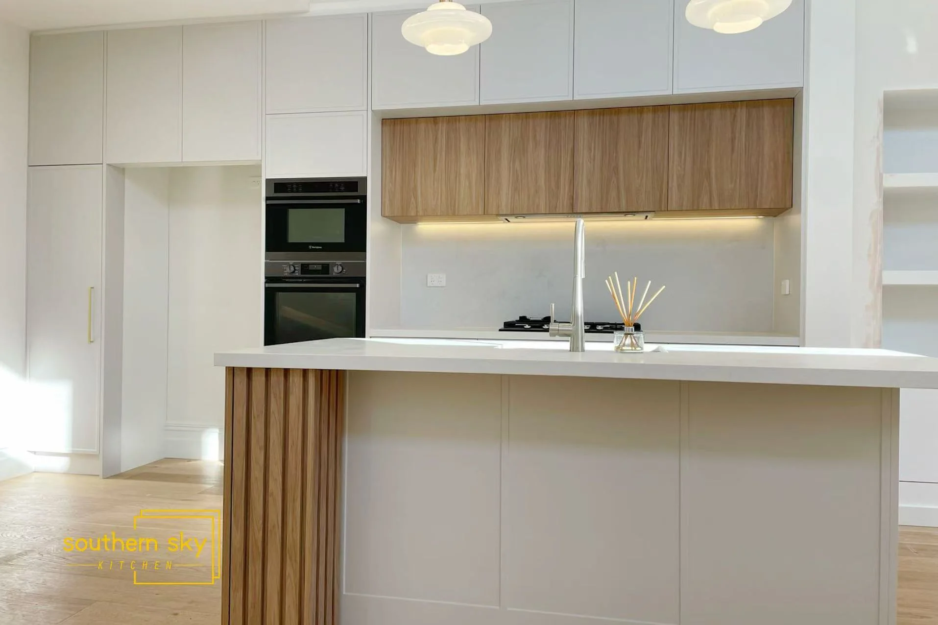 Sleek kitchen design with exquisite craftsmanship; modern charm meets functional elegance in every detail.